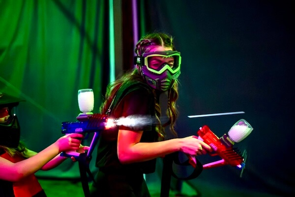 girl playing gel blaster