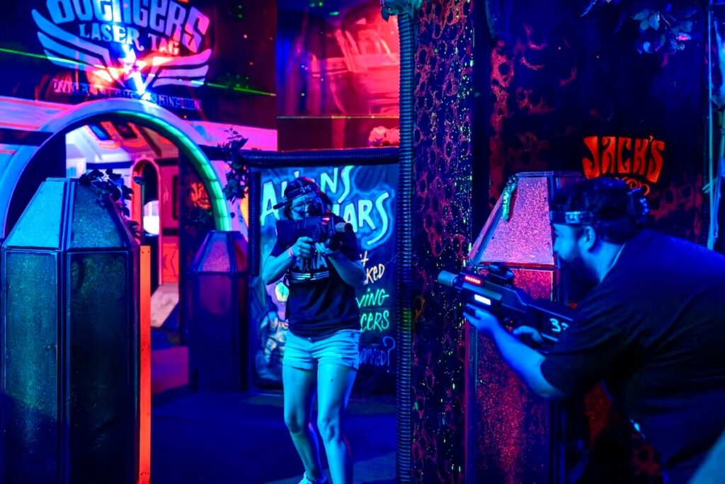 adults playing laser tag